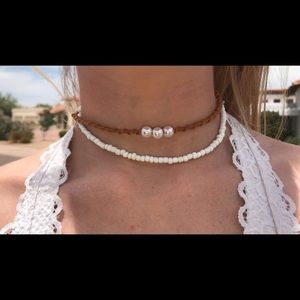 Brown, 3 pearled, hand made necklace.